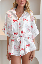 Sweet Bow Print Lapel Half Sleeve Tie Waist Loose Rompers