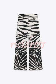 Breath of Freedom Animal Print High Rise Pocketed Wide Leg Pants
